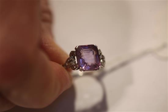 A 1920s/1930s platinum, amethyst and diamond ring, size O.